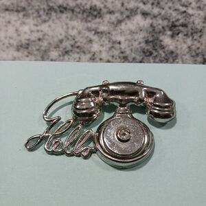 Vtg Women's Silvertone "Hello" Rotary Telephone Brooch.
